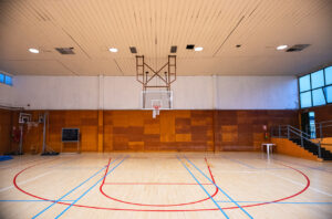 Wide-angle view of a basketball hoop.